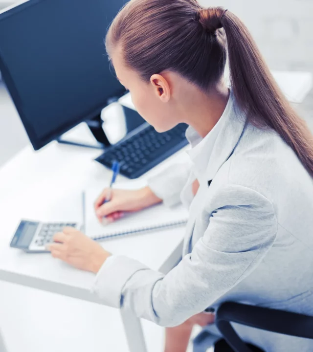 businesswoman with notebook and calculator 2022 12 16 09 46 54 utc